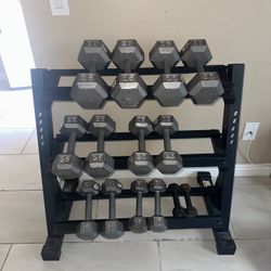 3-35 pairs of dumbbells weights 276lbs total plus rack