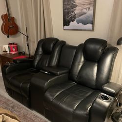 Black Dual Reclining Electric Love Seat.  Lights Up Blue. Like New