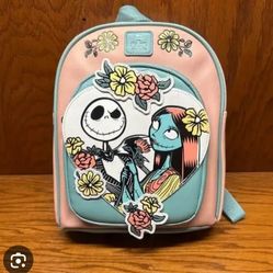 Loungefly Disney The Nightmare Before Christmas Jack & Sally Floral Heart Mini Backpack in a pastel pink and mint color block design