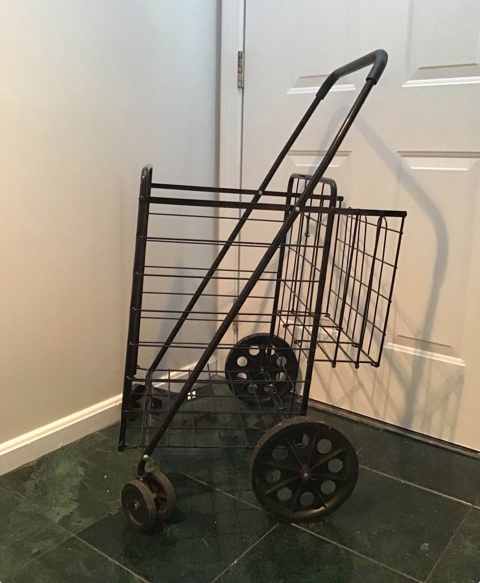 Heavy duty folding shopping cart with extra basket
