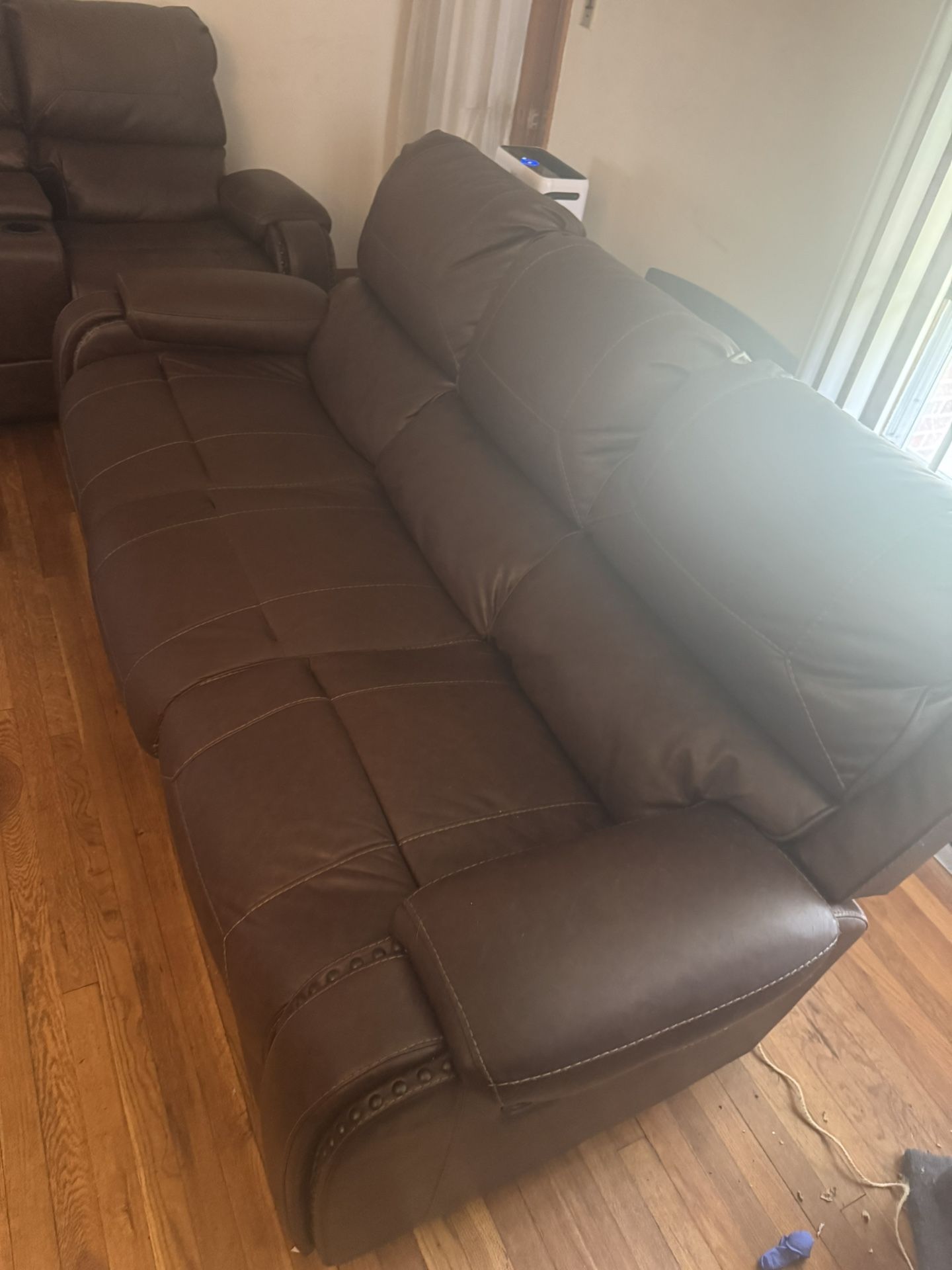 BROWN LEATHER SOFA ALL SEATS RECLINE