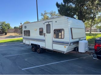1990 prowler by Fleetwood 19ft