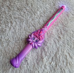 Enchant your child's playtime with this magical pink and purple wand.