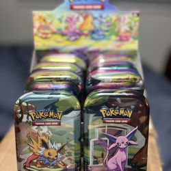 Pokemon Prismatic Evolutions Mini Tin