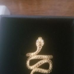 Snake Ring Size 8    925 18kt Gold IF U WANT IT BUY IT...IF NOT DON'T ASK ME QUESTIONS THAT I HAVE POSTED ALREADY!