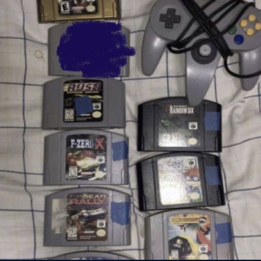 Nintendo 64 lot!!! Rush, F- Zero X, Top Gear Rally, Tom Clancy’s Rainbow six, Rug Rats, & Wipeout + 1 Original Remote