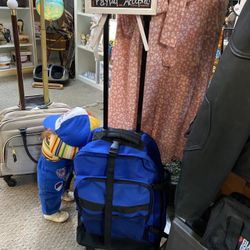 Blue and Black Rolling Luggage Backpack