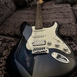Electric Guitar, Amplifier, and Stand Included