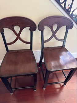 2 counter height wood stools