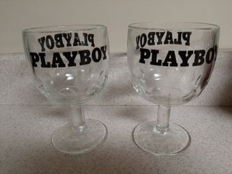 Pair of vintage playboy thumb print beer glasses
