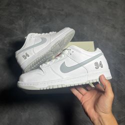 Supreme Dunk Low “White Metallic Silver”