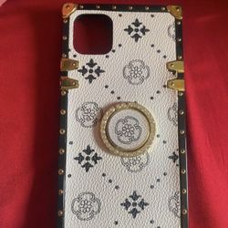 iPhone 16 Brown And White Flower Phone Covers 