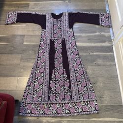 A traditional Palestinian dress embroidered with a distinctive classic design