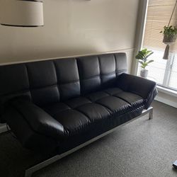 Black Leather Futon Sofa w/ Outlets