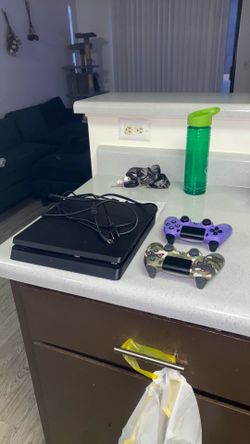 ps4 slim 1tb  w/ controllers and games