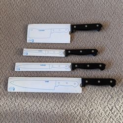 Four NEW cooking knives- chef, boning, carving and cleaver - carvel hall