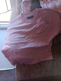 2 pink girls sweaters