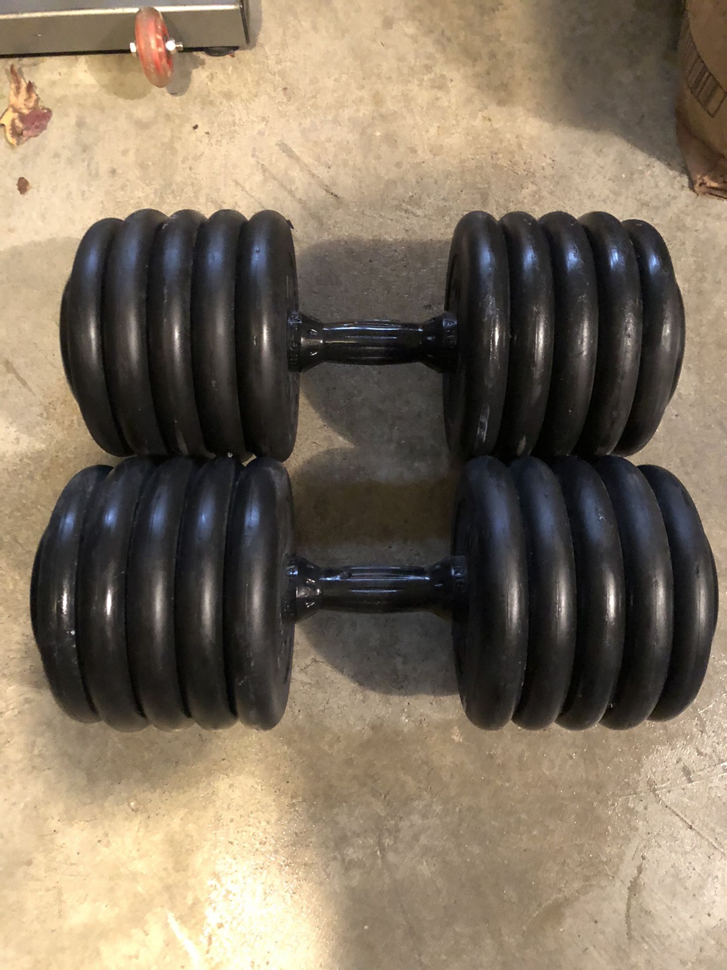 Pair Of  100 Lb Rubber Coated Dumbbells 
