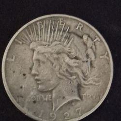   1927 Peace Silver Dollar. 
