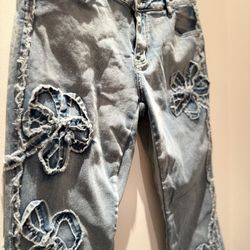 SHEIN Light Blue Jeans With Distressed Floral Design