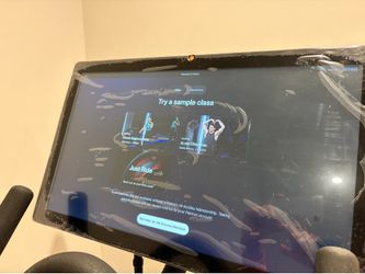 Peloton bike - like new. 10 rides total + shoes + mat