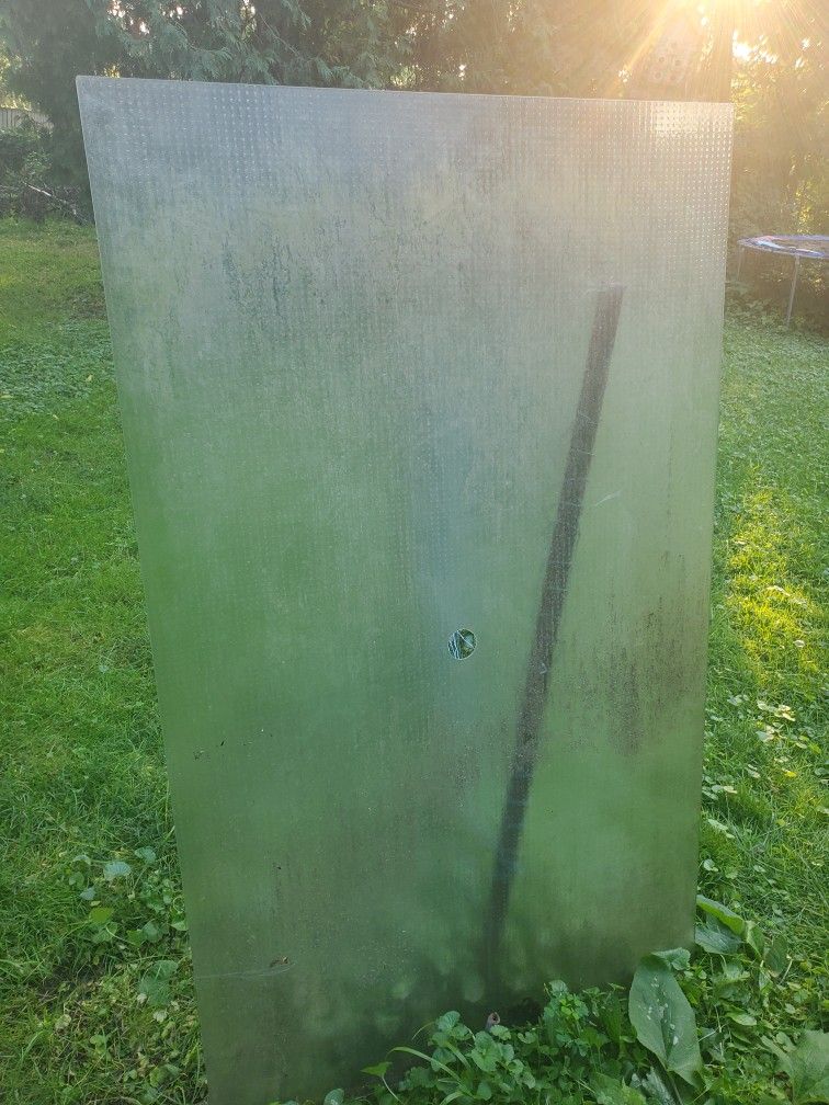 Frosted glass table top with umbrella hole