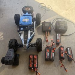 RC Lasernut Tenacity Ultra 4 Rock Racer Plus Batteries And Chargers
