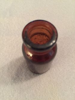 Miniature antique bottle