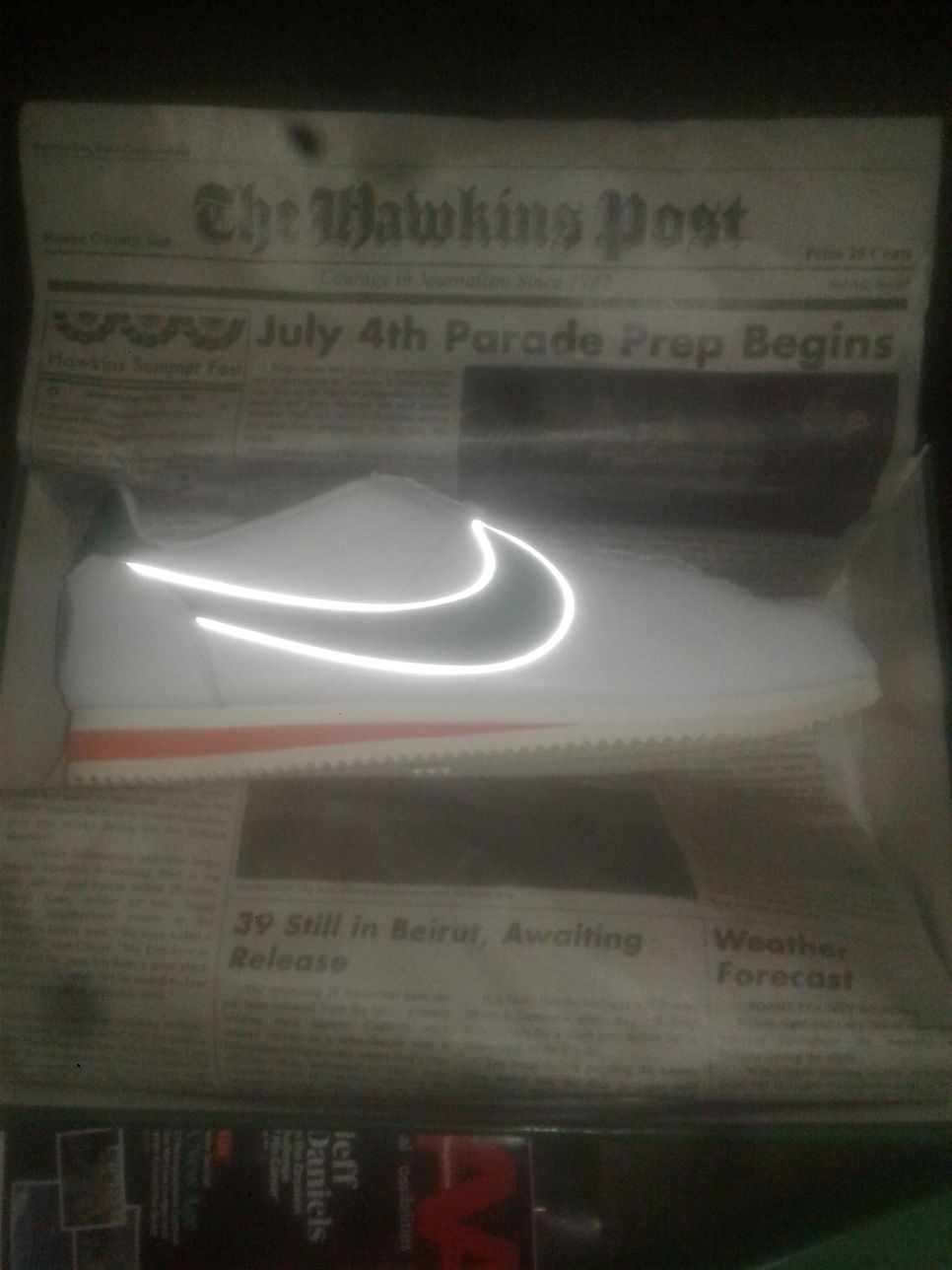 1985 Nike Stranger things edition , with Hawkins high school newspaper shoe wrap