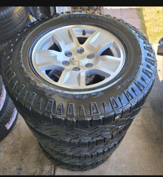 17's STOCK Rims And Tires  Rim's chevy Silverado/Tahoe/Suburban/GMC/YUCON /     ALL MATCHING GOODYEAR WRANGLER Tires  6 lugs  17 inch rims
Fits: