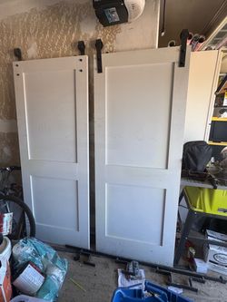 Dual wooden barn doors