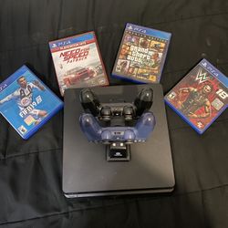 Ps4 with 2 controllers and 4 games