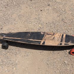 Vintage Longboard Skateboard with Caliber Trucks and Red Wheels - Rustic Style

