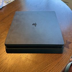PS4 With Games And Controllers 