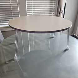 Collapsible White Table 24" Wide And 12" High