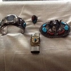 Men's watch, belt buckle, ring, lighter case all are silver with turquoise and coral