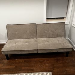 Sage green futon 42L 34D in couch position and 70.5D in bed position