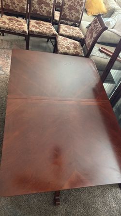 Broyhill dining room set, table-8 chairs and 2 leaves and china Hutch