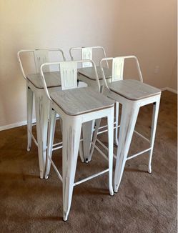 Four counter height kitchen stools