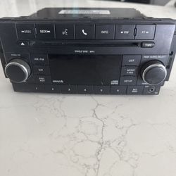2008 -2017 Jeep Wrangler  Radio OEM CD player Sirius XM U Connect OEM RES W/VIN#