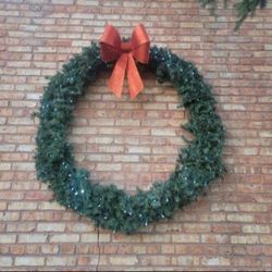 Artificial 54-in LED Light Up Wreath. Comes With Free 24 Inch Artificial Reef