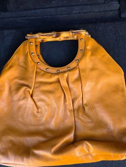 Authentic Gucci Bamboo Handle Leather Hobo Bag + Dust Bag & Cards
Price: