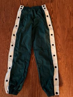 Green track pants