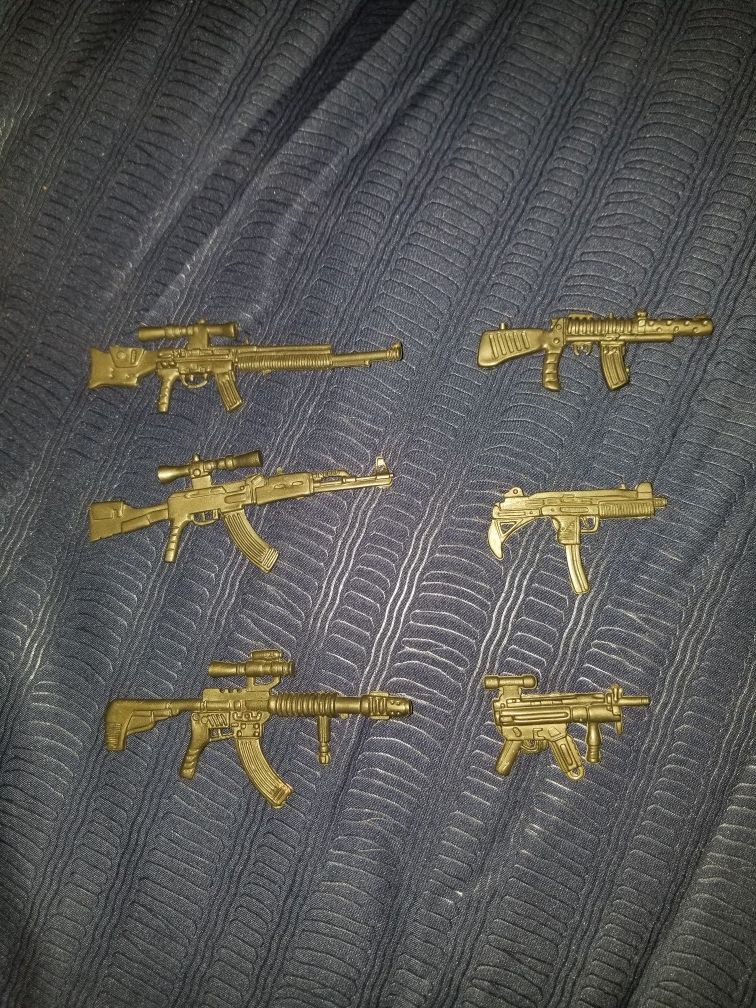Early 2000s toy guns for action figures
