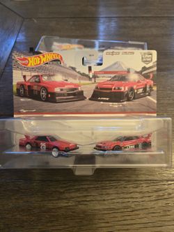 Hot Wheels Premium 2 Pack Red Nissan Skyline Silohuette And LB-ER34 Super Silohuette Nissan Skyline