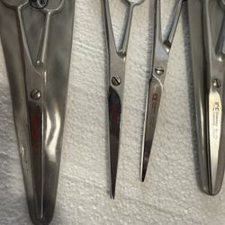 assorted ICE Tampered stainless scissors plus 1 SONA scissor for sale.  All are brand new.  Asking Price Is $100.00