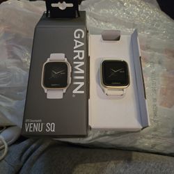 brand new Garmin gps smart watch