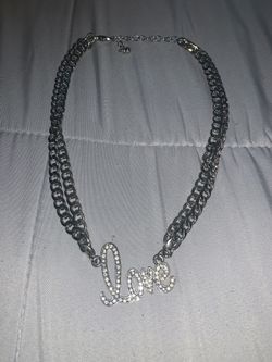 Silver necklace with charm