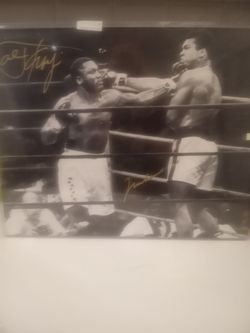 Autographed poster of joe Frazier and Muhammad Ali