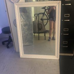 Vintage white 33 by 45 mirror 